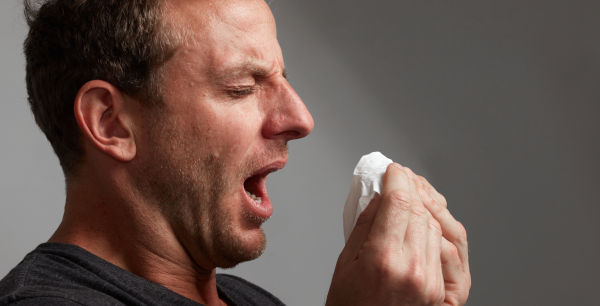 a man sneezing