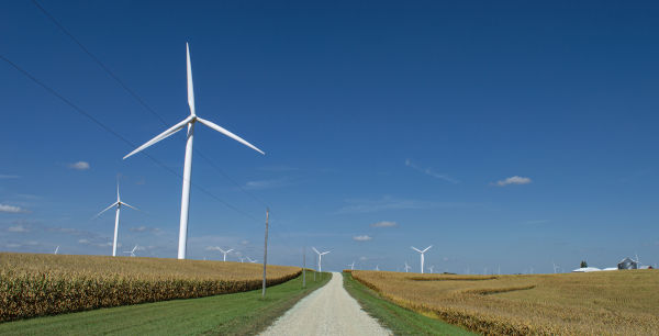 wind turbines against a blue sky