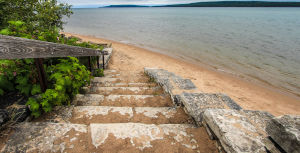 steps leading to a sandy beach